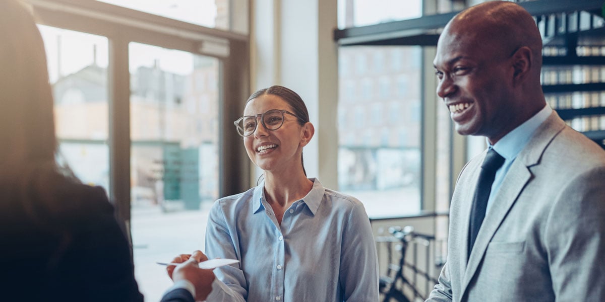 costumer-churn-group-of-customers-smiling