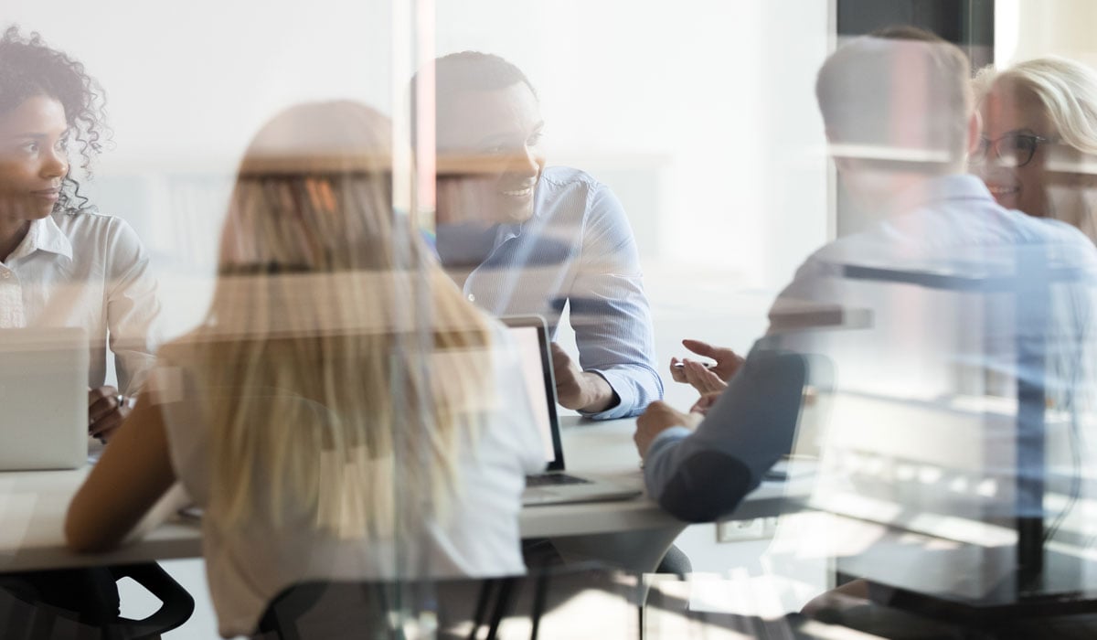 cx_employees-in-meeting-window-group-1200x700